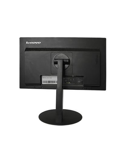 Un monitor Lenovo negro de espaldas montado en un soporte redondo